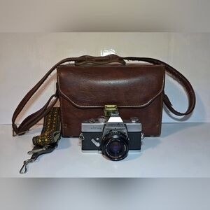 Minolta SRT 201 35mm SLR Film Camera W/ Rokkor-X 45mm Lens, Carrying Bag & Strap